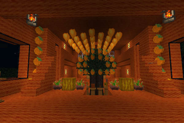 Screenshot of a building Minetest server JT2. It shows the interior of a temple made out of orange wool. There are 3 staircase. Two at the left and right side going upwards, one in the middle going downwards. The middle staircase leads to a tree which has lots of oranges in its crown. In front of the tree, some pedestals showing. At the ceiling, there are many orange balloons. At the left and right, there are windows made out of obsidian glass.